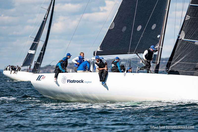 a group of people on a sailboat